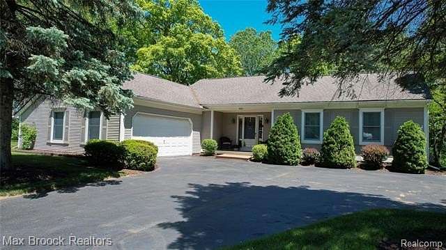 1.68 Acres of Land with Home for Sale in Springfield Township, Michigan