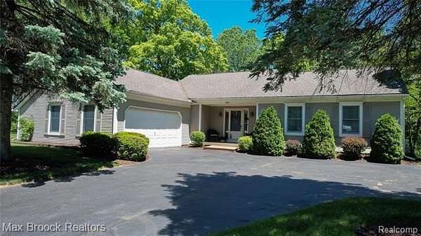 1.68 Acres of Land with Home for Sale in Springfield Township, Michigan