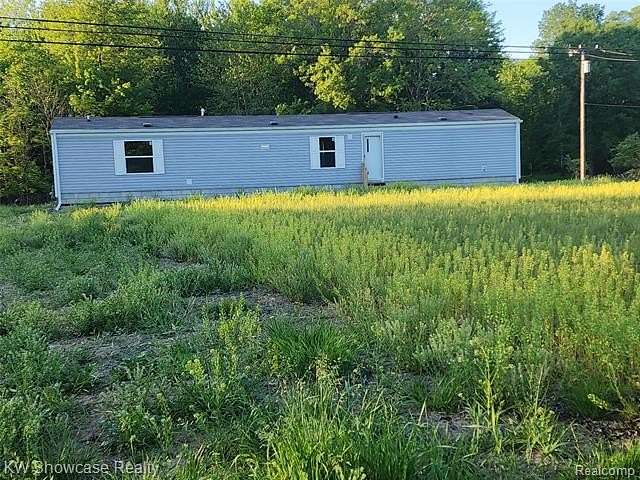 2.57 Acres of Land with Home for Sale in China Township, Michigan