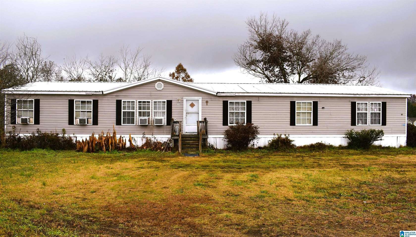 3 Acres of Land with Home for Sale in Holly Pond, Alabama