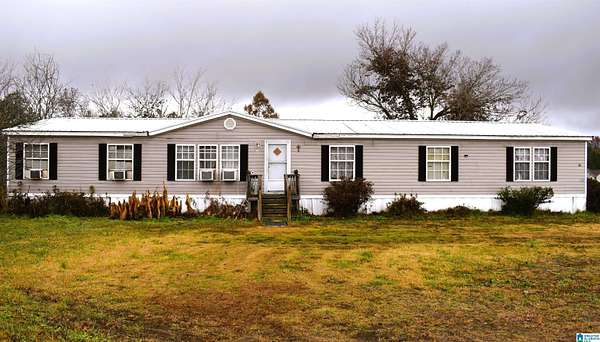3 Acres of Land with Home for Sale in Holly Pond, Alabama