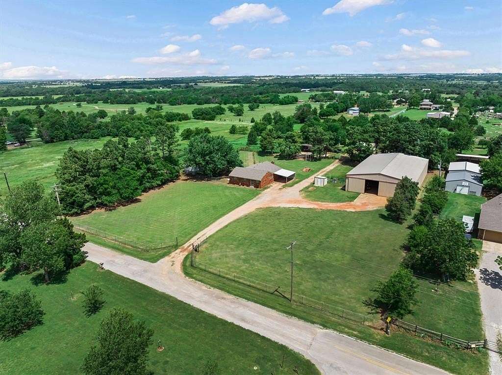 5 Acres of Land with Home for Sale in Edmond, Oklahoma