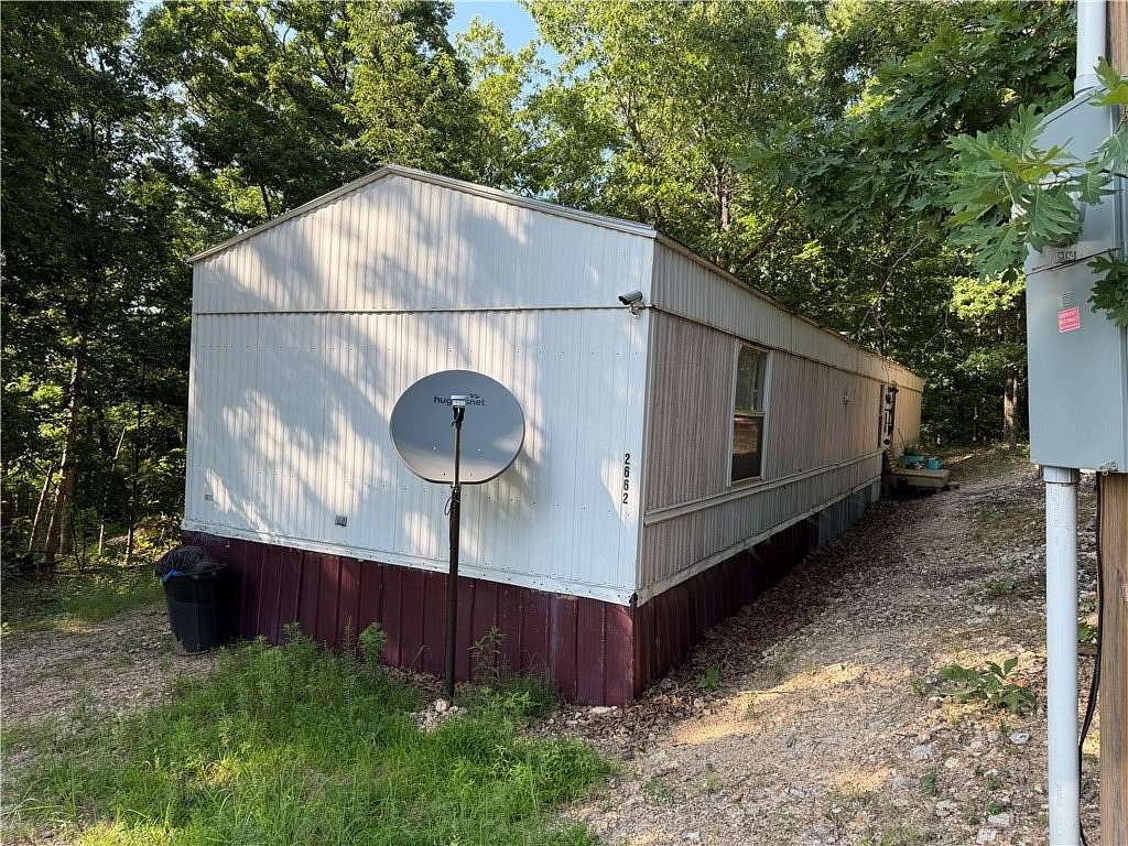 3.74 Acres of Land with Home for Sale in Yellville, Arkansas