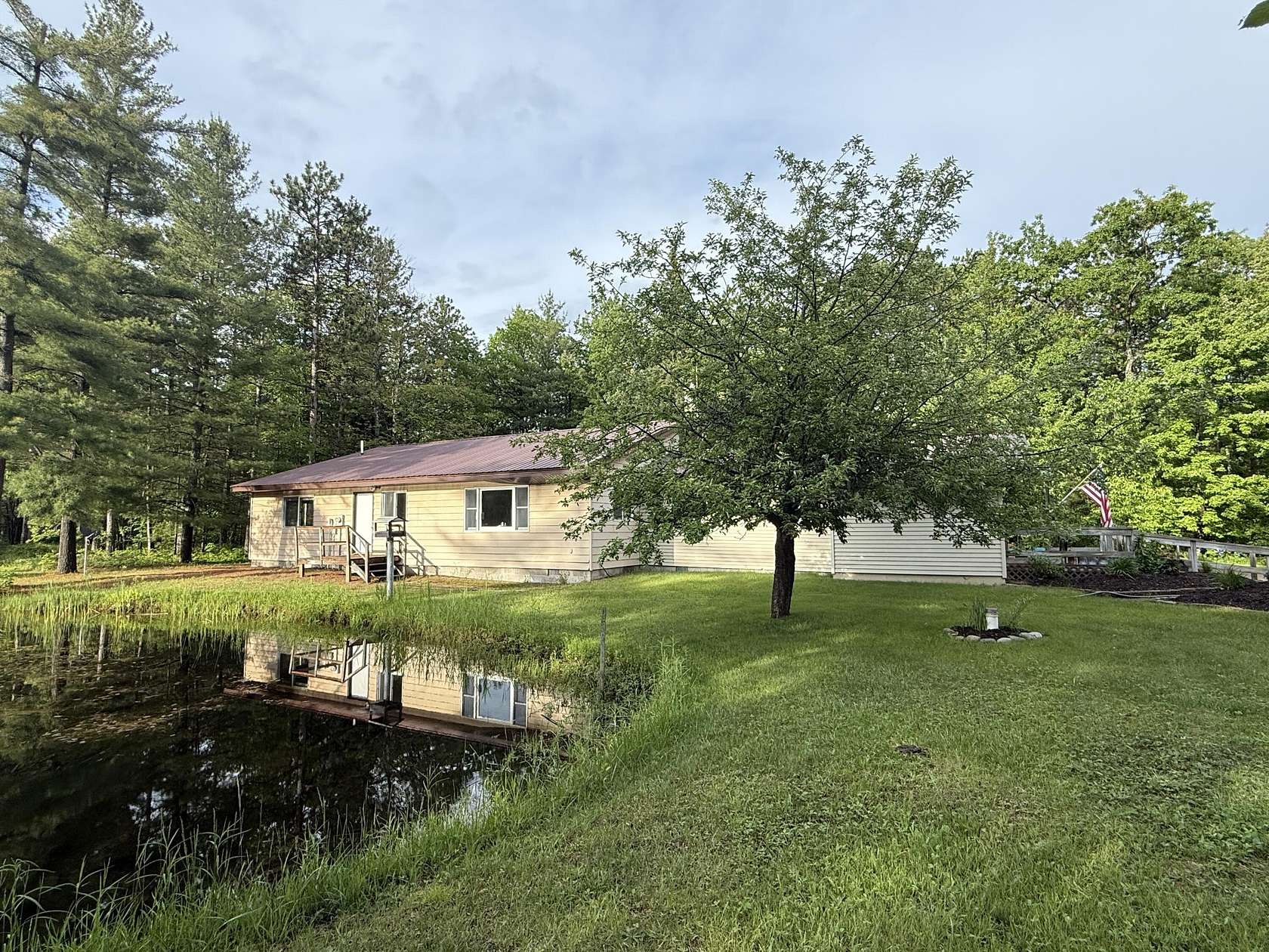 10 Acres of Recreational Land with Home for Sale in Ocqueoc, Michigan