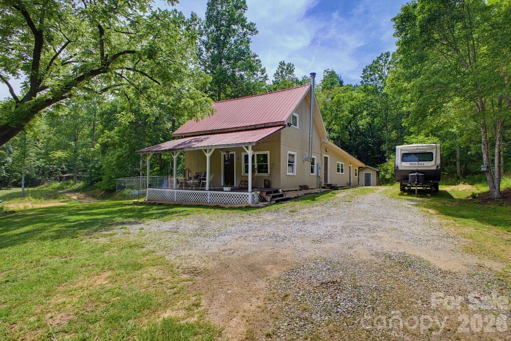 16.5 Acres of Land with Home for Sale in Mill Spring, North Carolina