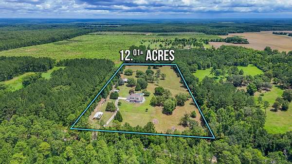 12 Acres of Land with Home for Sale in Baker, Florida