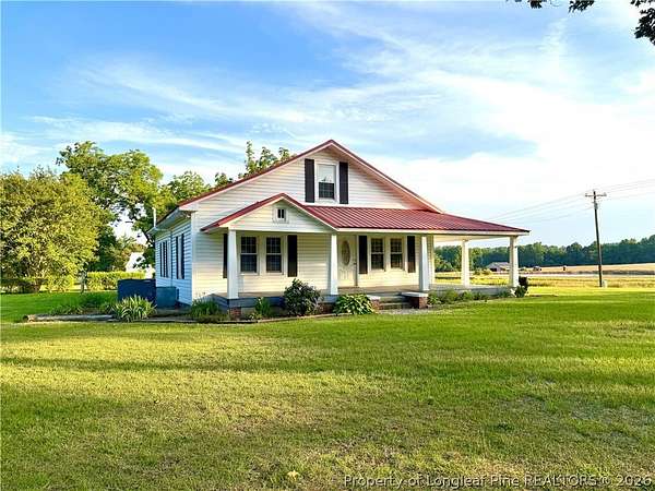 6 Acres of Land with Home for Sale in Broadway, North Carolina
