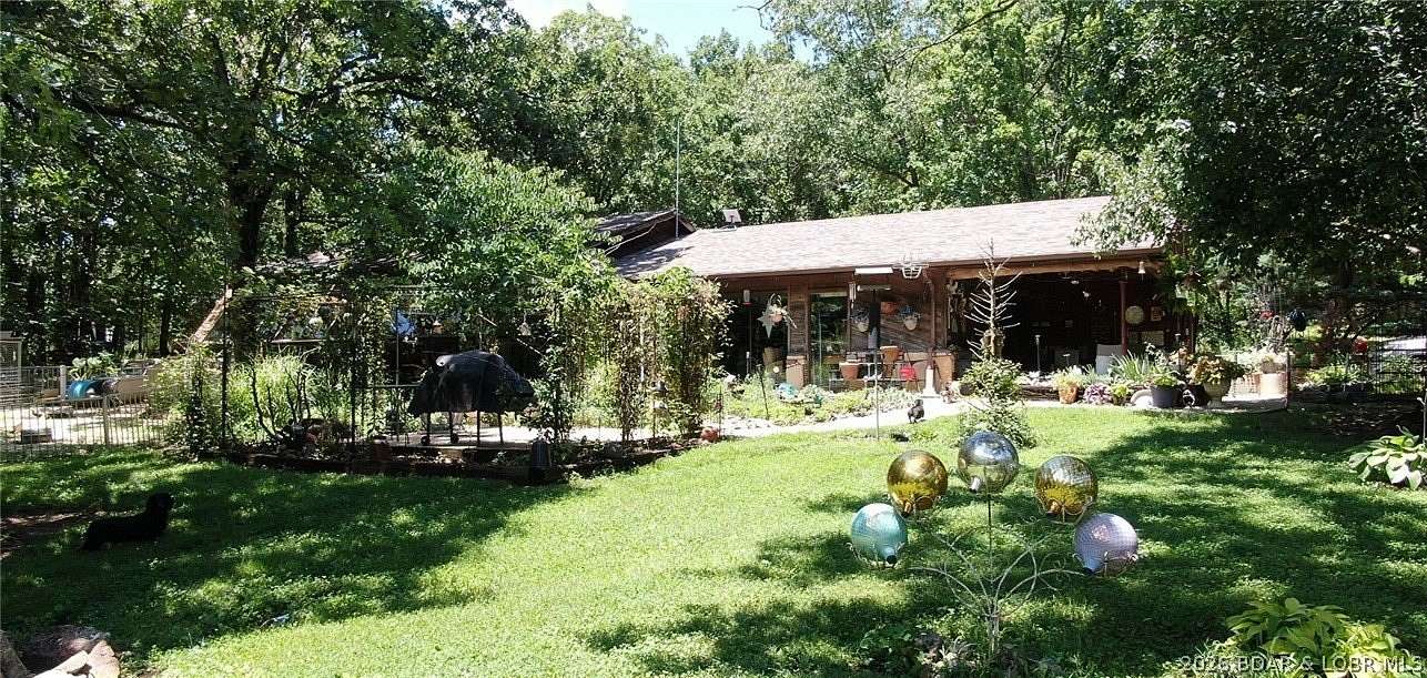 23 Acres of Land with Home for Sale in Linn Creek, Missouri