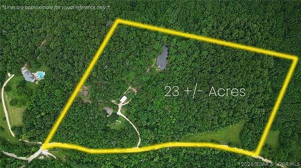23 Acres of Agricultural Land with Home for Sale in Linn Creek, Missouri