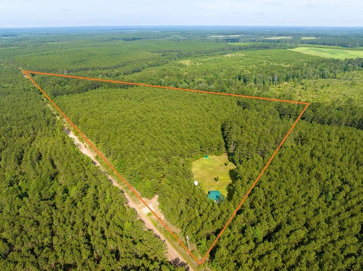21 Acres of Recreational Land with Home for Sale in Groveton, Texas