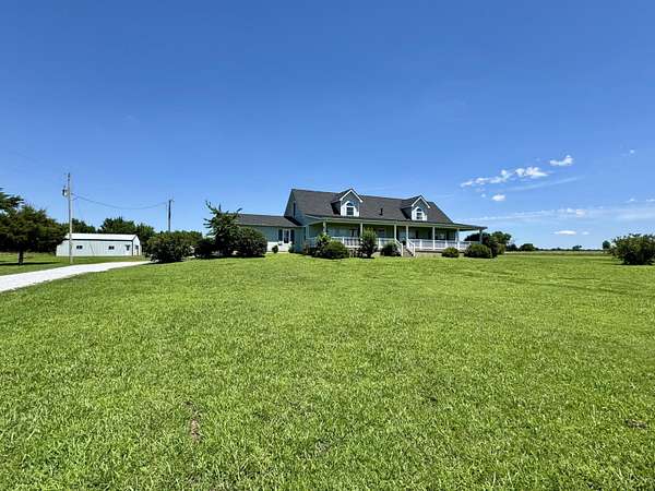 9.53 Acres of Land with Home for Sale in Neosho, Missouri