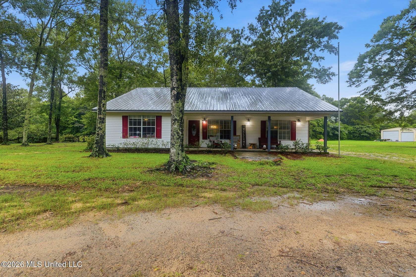 1.6 Acres of Land with Home for Sale in McHenry, Mississippi