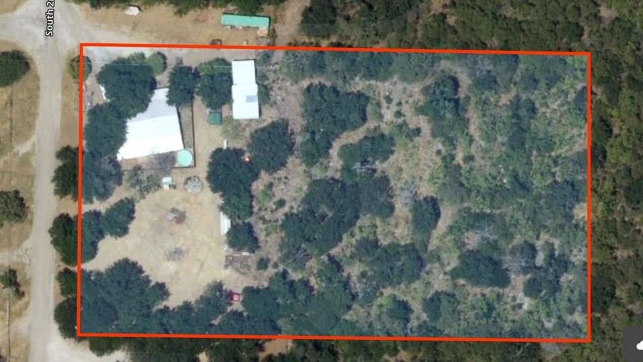2.12 Acres of Land with Home for Sale in Palo Pinto, Texas