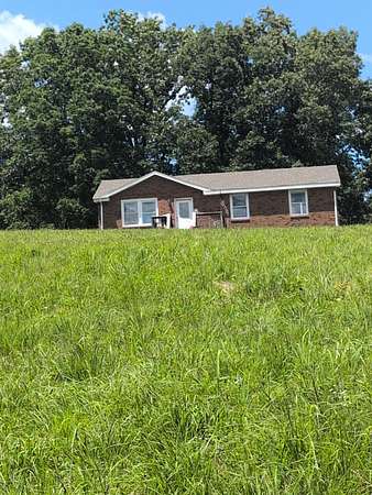 18 Acres of Land with Home for Sale in Indian Mound, Tennessee