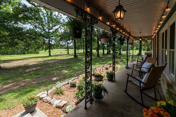 54 Acres of Land with Home for Sale in Scotts Hill, Tennessee