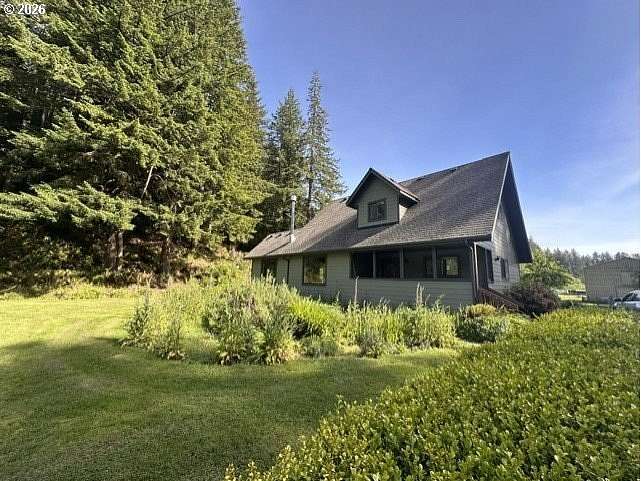 11.8 Acres of Land with Home for Sale in North Bend, Oregon