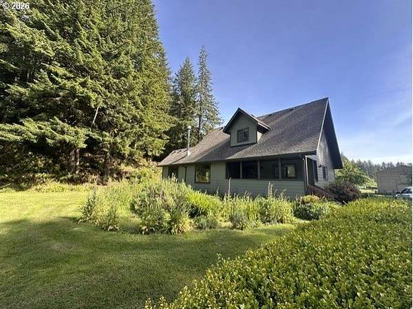 11.8 Acres of Land with Home for Sale in North Bend, Oregon