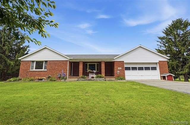 3 Acres of Land with Home for Sale in Hamburg Township, Michigan