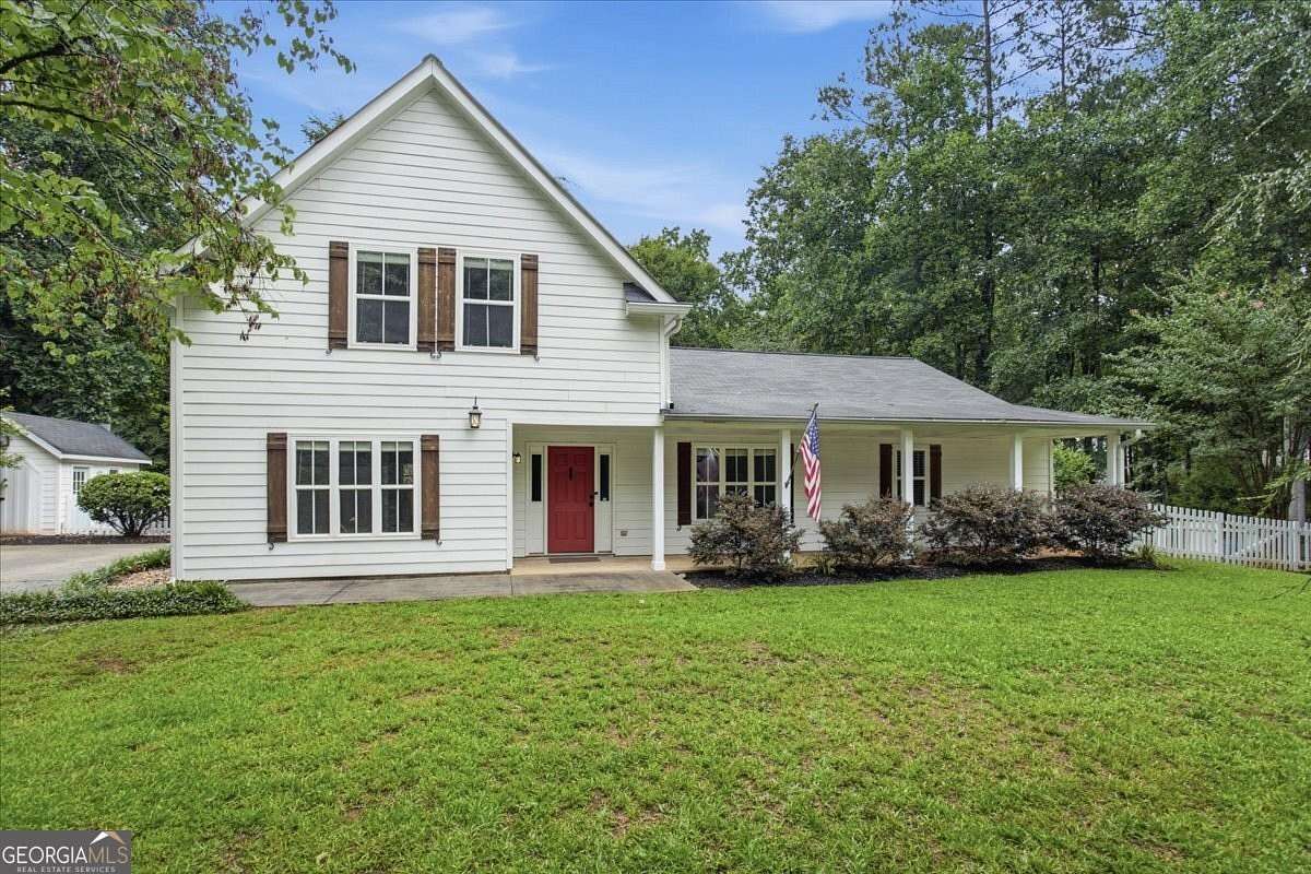 2.35 Acres of Land with Home for Sale in Sharpsburg, Georgia