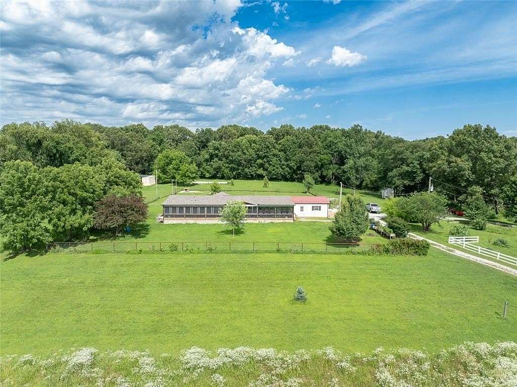 19.7 Acres of Land with Home for Sale in Benton Township, Missouri