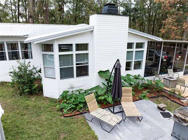 5.64 Acres of Land with Home for Sale in Alachua, Florida