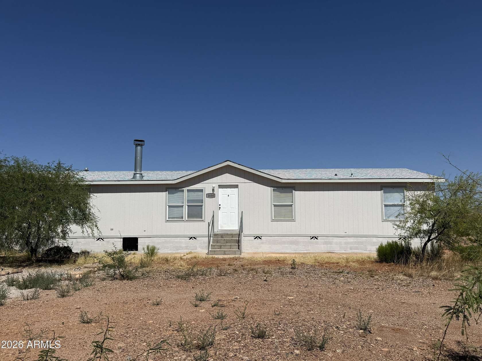 4 Acres of Land with Home for Sale in Huachuca City, Arizona
