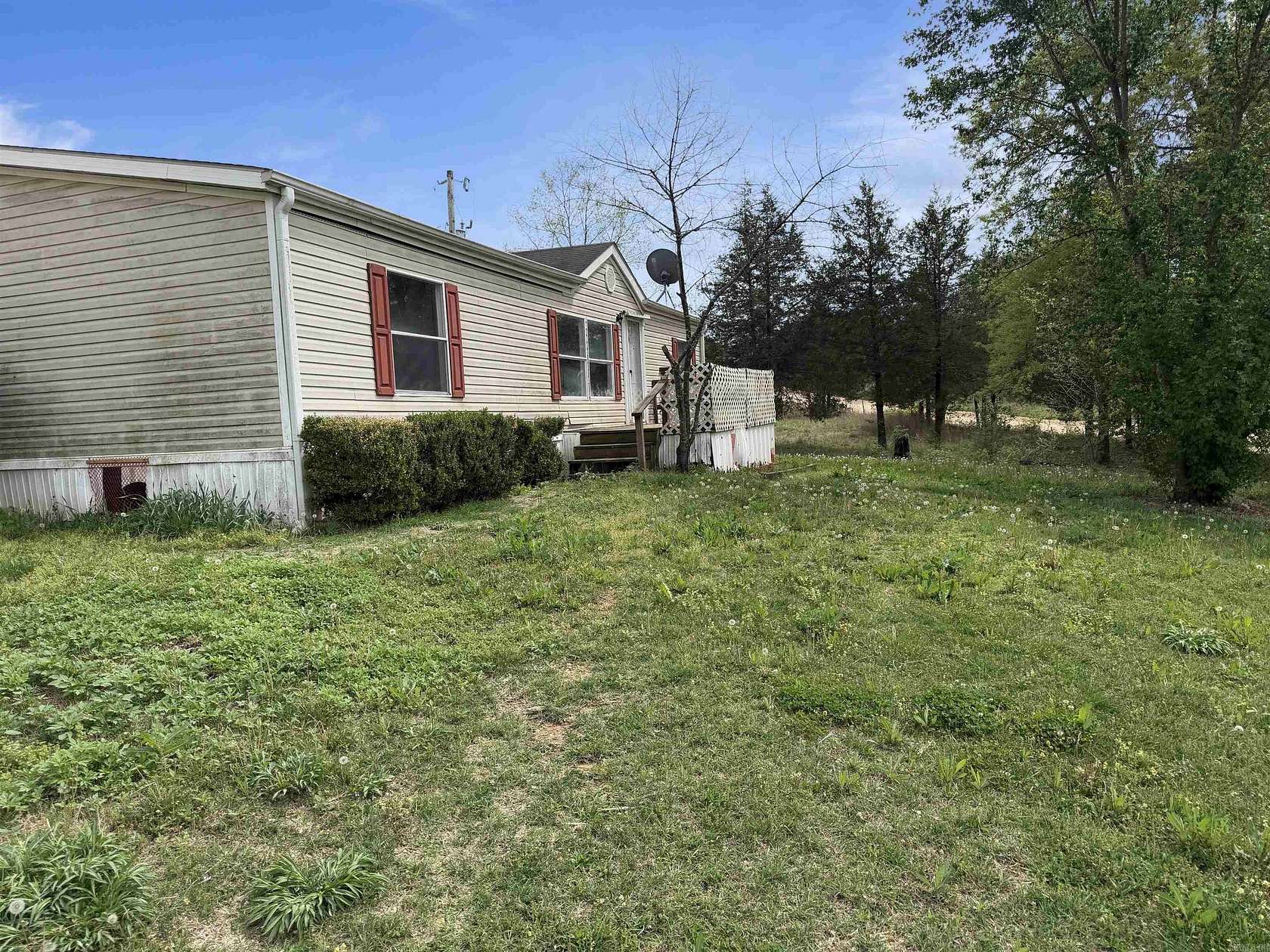 6.27 Acres of Land with Home for Sale in Evening Shade, Arkansas