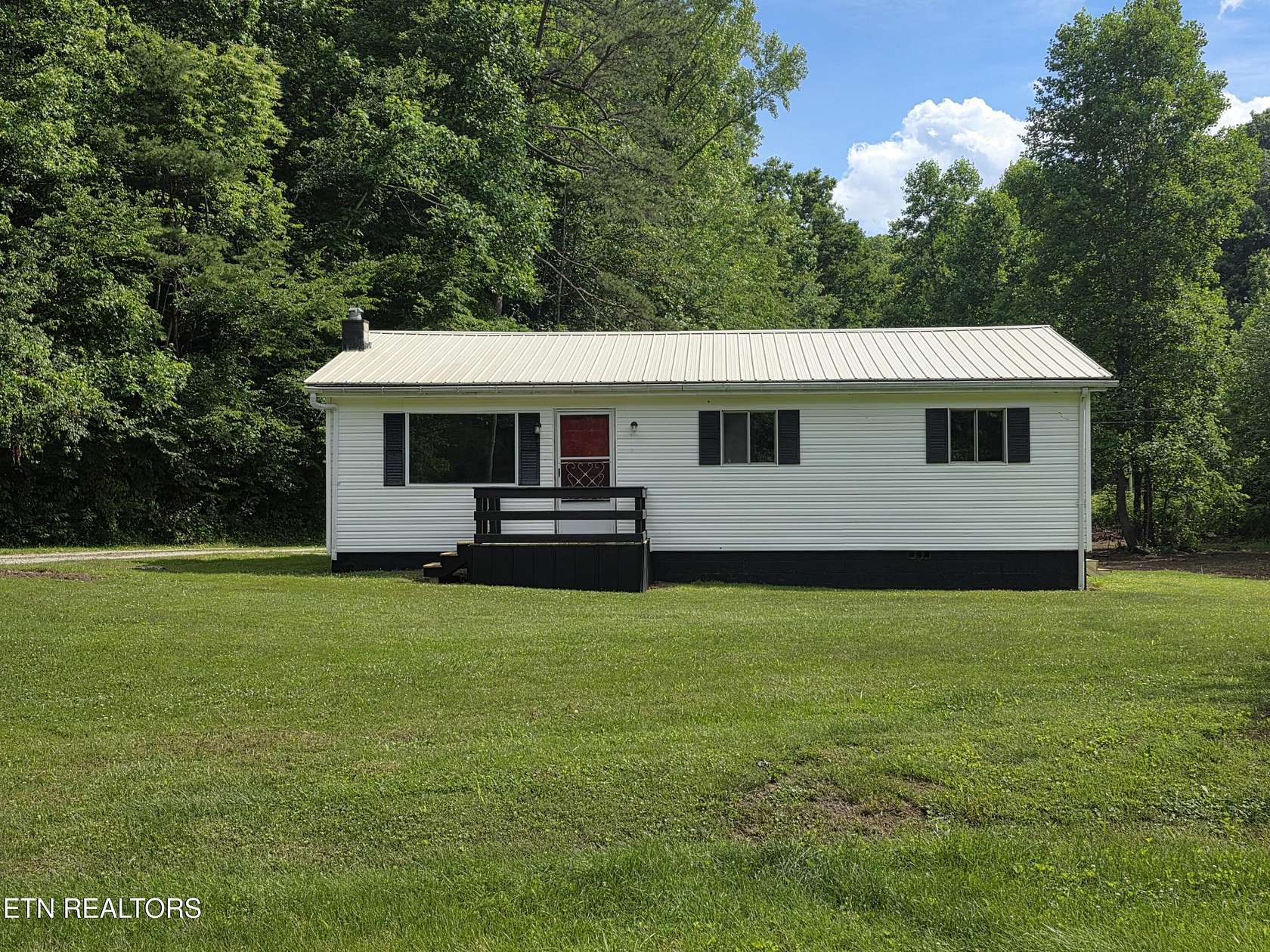2.76 Acres of Land with Home for Sale in Robbins, Tennessee