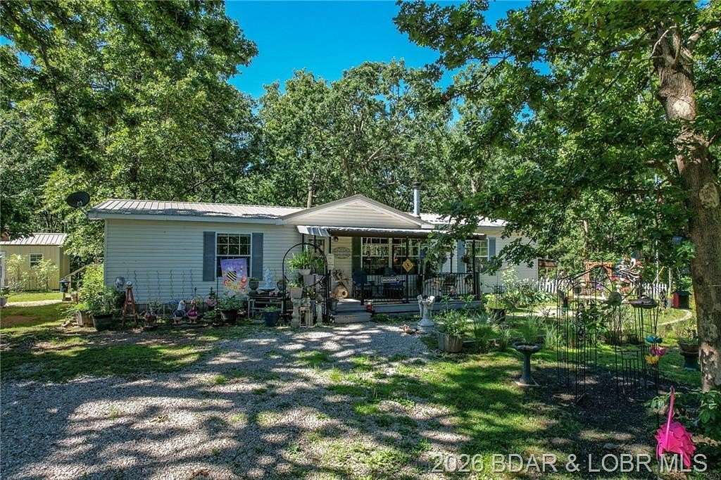 8.8 Acres of Land with Home for Sale in Climax Springs, Missouri