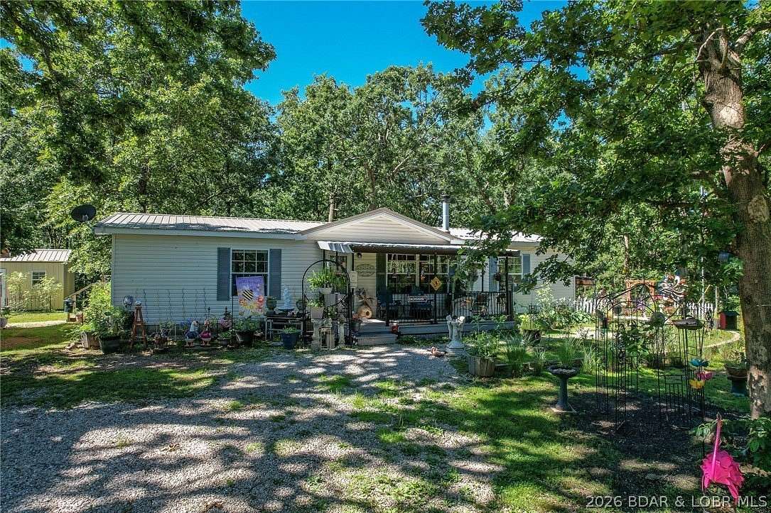 8.8 Acres of Land with Home for Sale in Climax Springs, Missouri