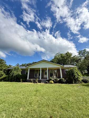 2.32 Acres of Land with Home for Sale in Summertown, Tennessee