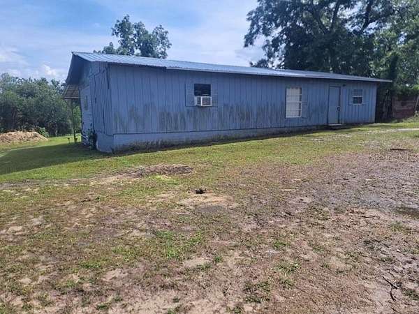 2.62 Acres of Land with Home for Sale in Marianna, Florida