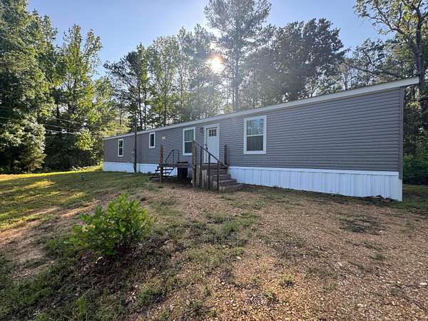 9.4 Acres of Land with Home for Sale in Brilliant, Alabama