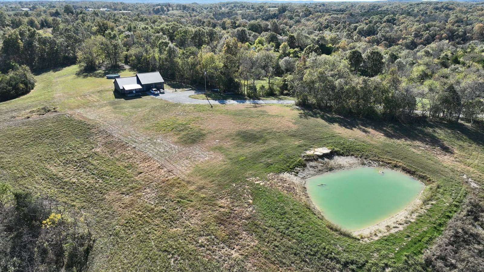 53 Acres of Recreational Land with Home for Sale in Loretto, Kentucky
