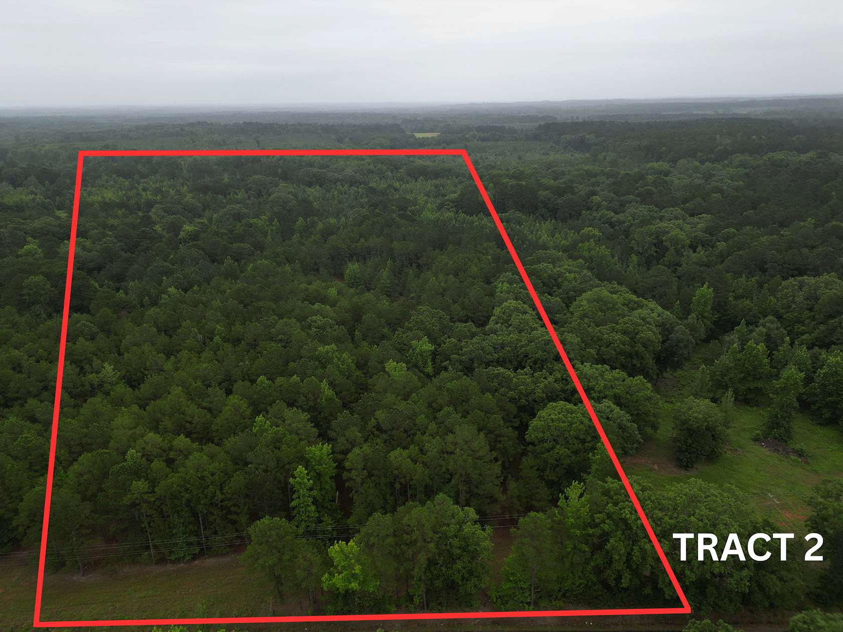 10 Acres of Land for Sale in Atlanta, Texas