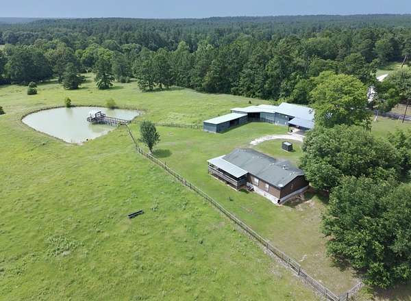 31.7 Acres of Land with Home for Sale in Huntsville, Texas