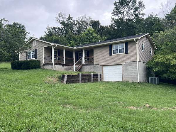 3 Acres of Land with Home for Auction in Chapmansboro, Tennessee