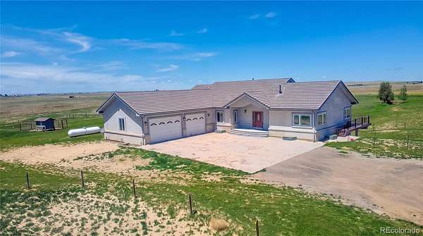 35.7 Acres of Agricultural Land with Home for Sale in Strasburg, Colorado
