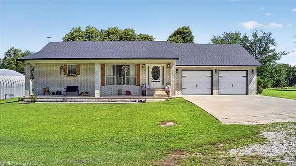 10 Acres of Land with Home for Sale in Muldrow, Oklahoma