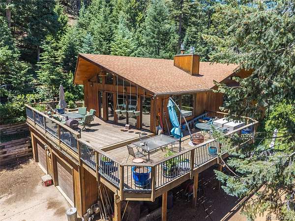 8 Acres of Land with Home for Sale in Larkspur, Colorado