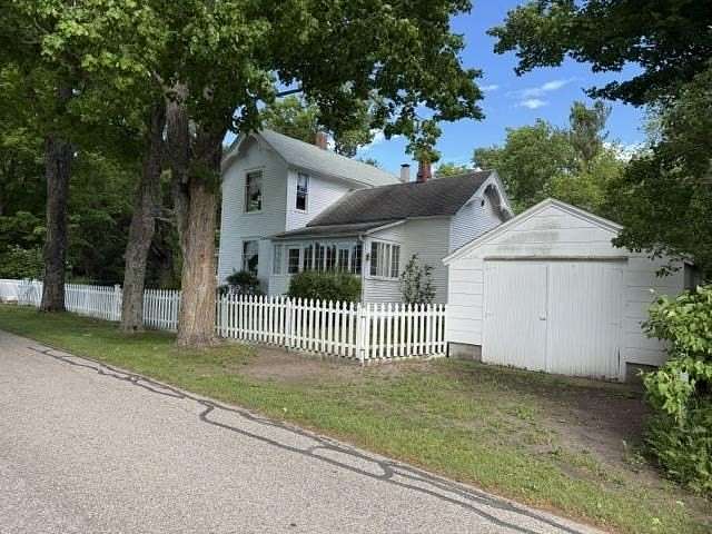 9.28 Acres of Land with Home for Sale in Cross Village, Michigan