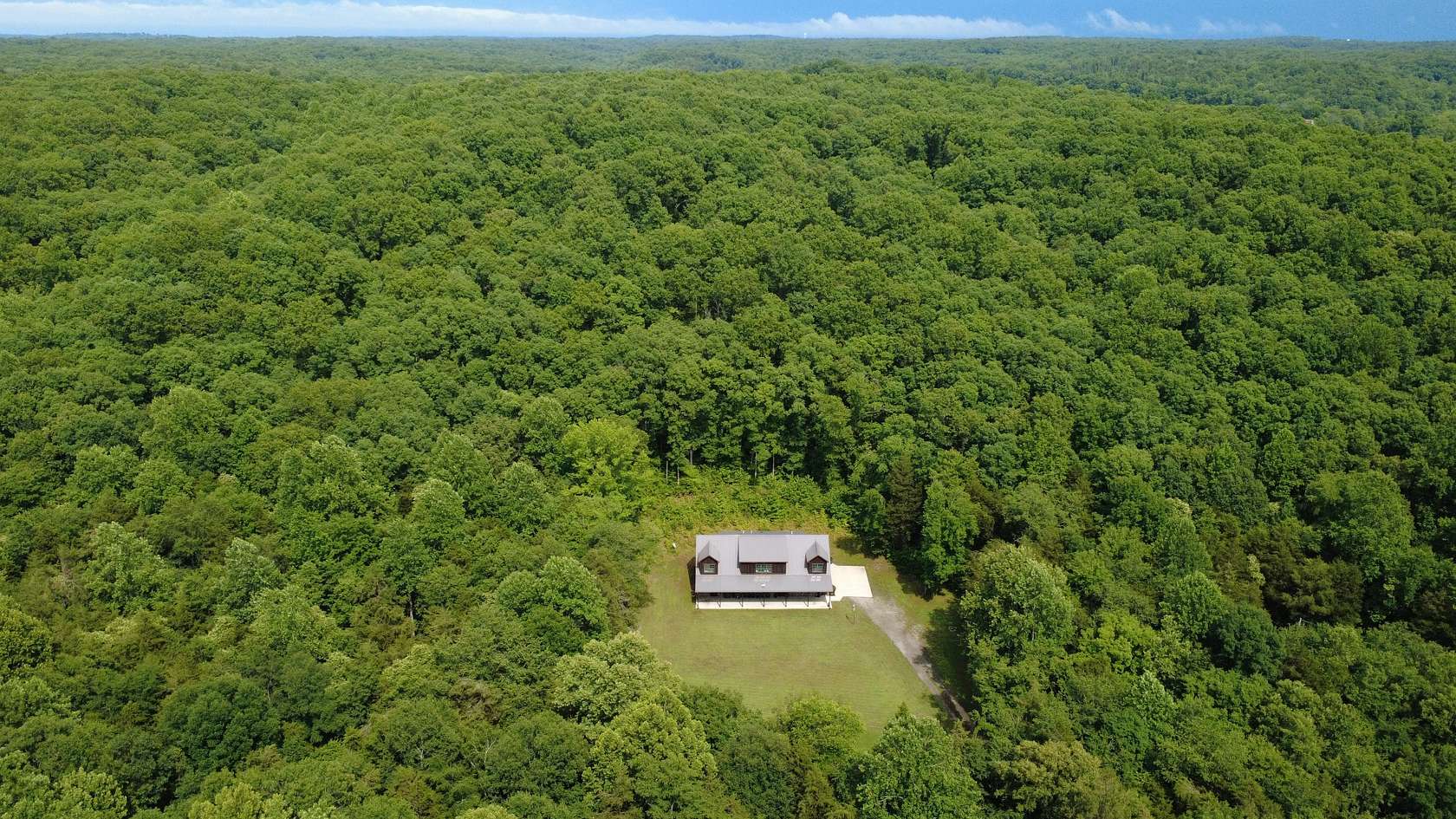 241 Acres of Recreational Land with Home for Sale in Nunnelly, Tennessee