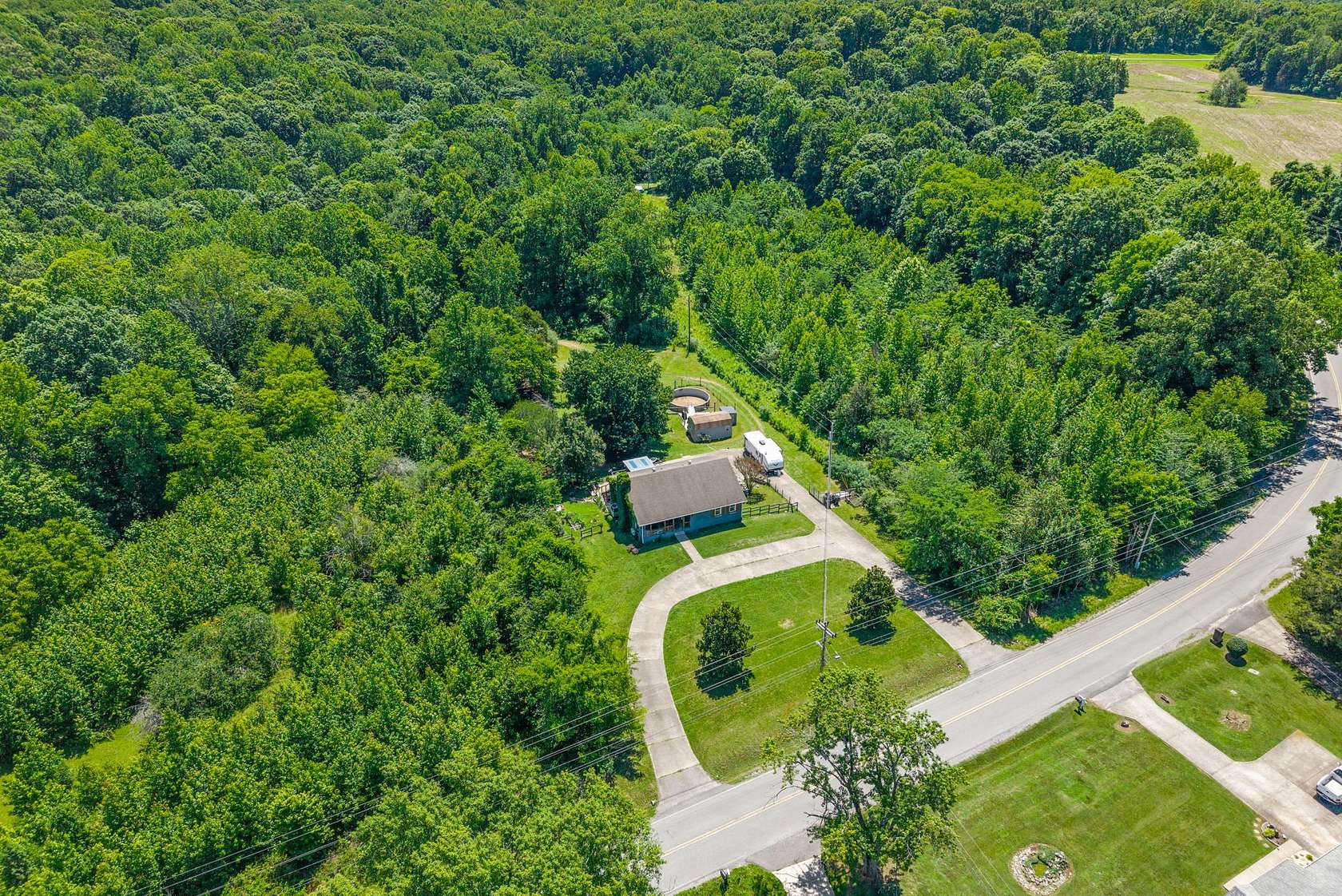 5.8 Acres of Land with Home for Sale in Clarksville, Tennessee