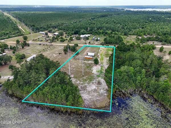 2.48 Acres of Land with Home for Sale in Alford, Florida