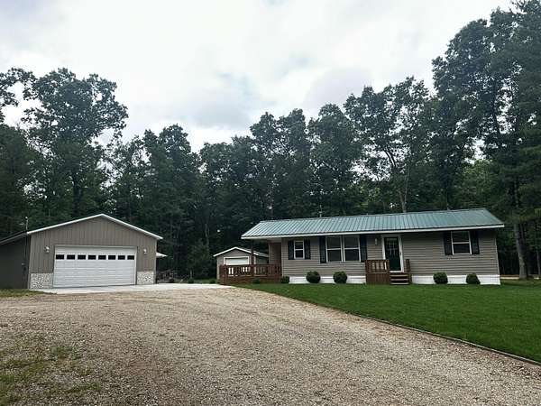 1 Acre of Land with Home for Sale in Irons, Michigan