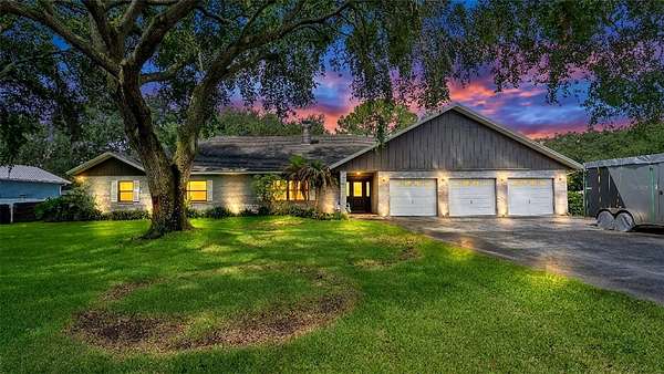 2 Acres of Land with Home for Sale in Kathleen, Florida