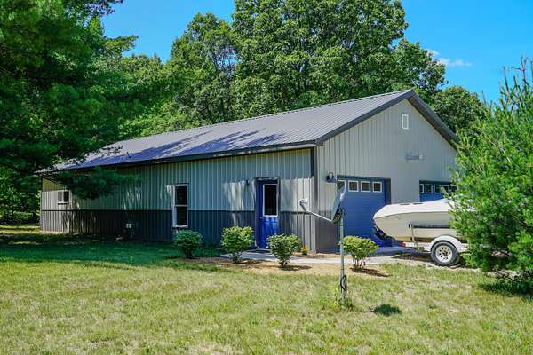 2.5 Acres of Land with Home for Sale in Interlochen, Michigan