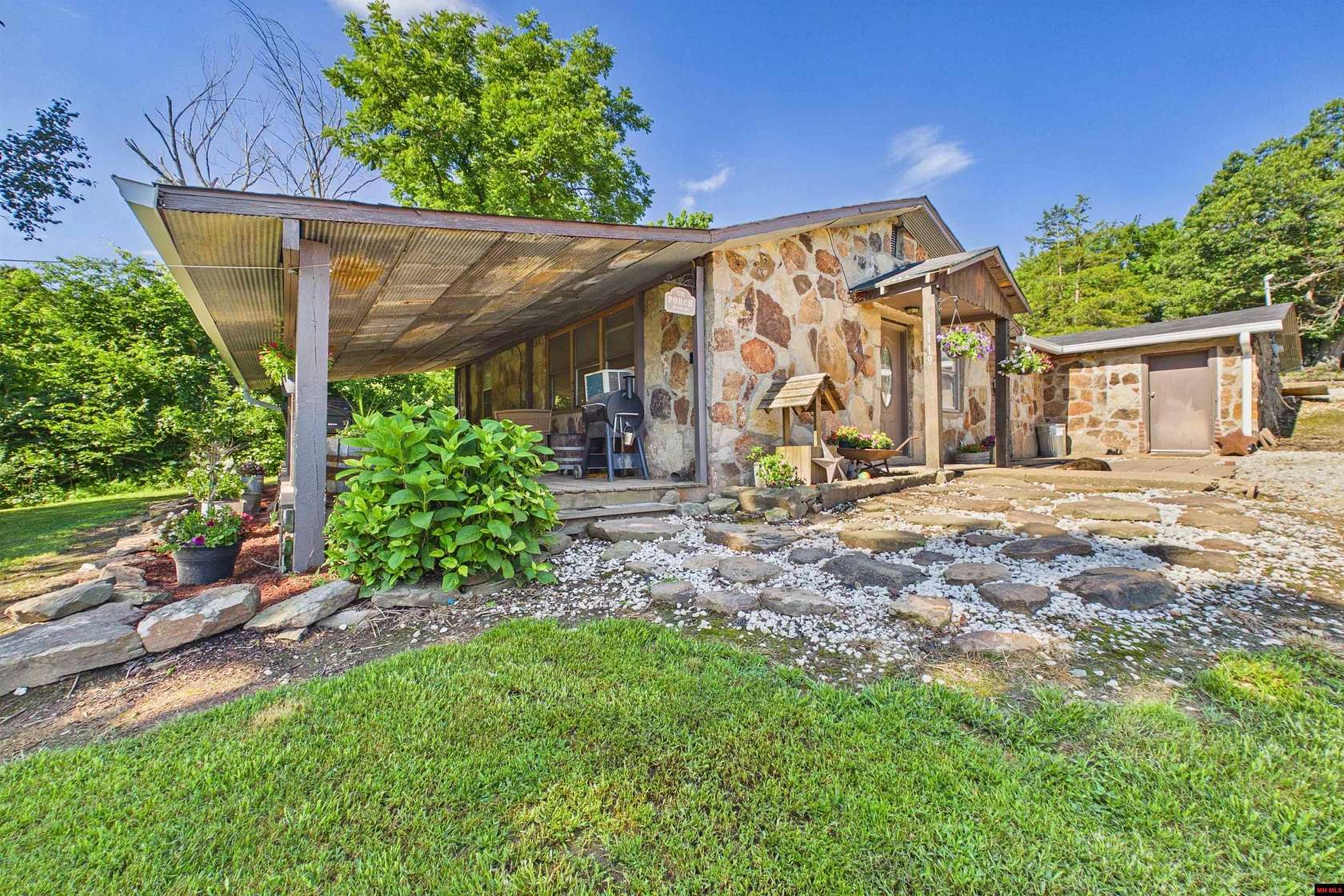 4.89 Acres of Land with Home for Sale in Gassville, Arkansas