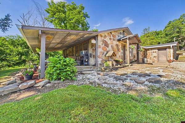 4.89 Acres of Land with Home for Sale in Gassville, Arkansas