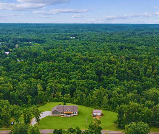 13.2 Acres of Land with Home for Sale in Hohenwald, Tennessee
